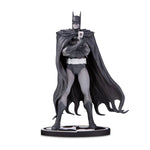 McFarlane Batman Black and White Brian Bolland statue holding Joker card on oval bat-logo base
