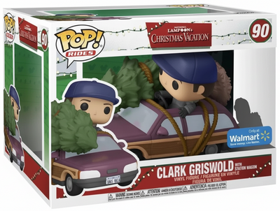 Funko Pop! Movies 'The Great Christmas Vacation' Clark Griswold vinyl figure in its original window box packaging, featuring the character in a purple car with a Christmas tree, with a Walmart Exclusive sticker on the box.