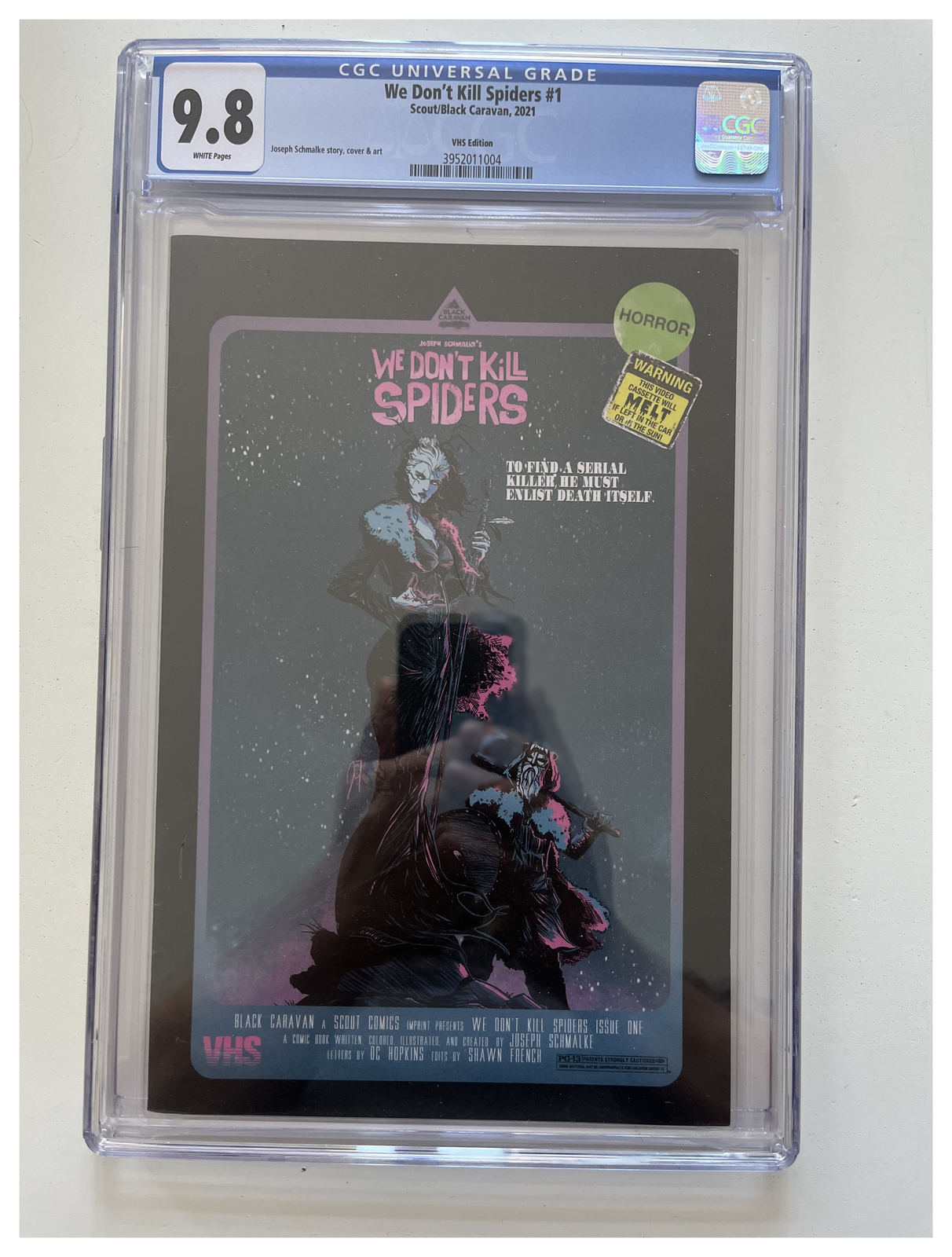 We Don't Kill Spiders #1 VHS Edition CGC 9.8 enhanced slab photo